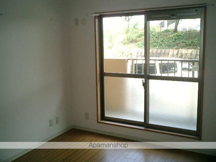 滋賀県栗東市手原2丁目の賃貸マンションの居間