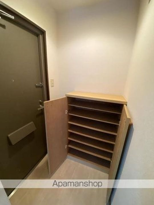 シュクレ藤塚302の玄関