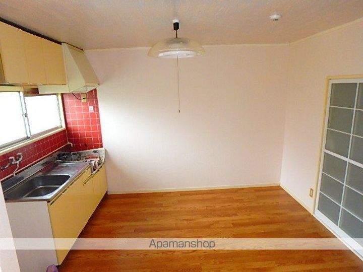 愛知県丹羽郡扶桑町大字斎藤字本郷屋敷の賃貸アパートの居間