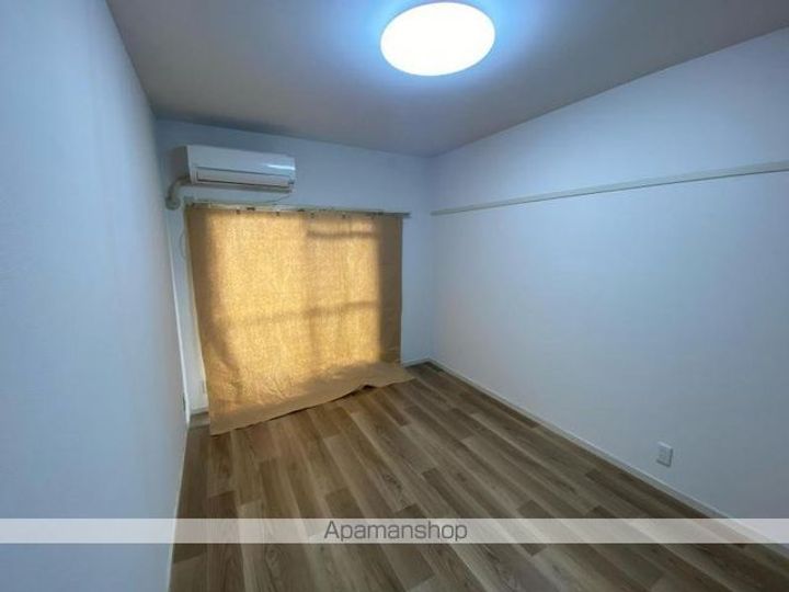 香川県高松市多賀町3丁目の賃貸マンションの居間