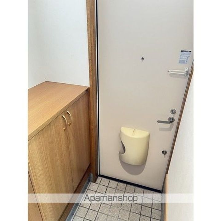 スーパーハイム北央1-1の玄関