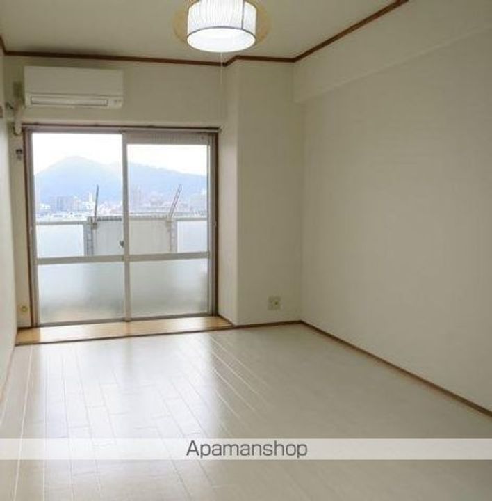 香川県高松市扇町1丁目の賃貸マンションの居間