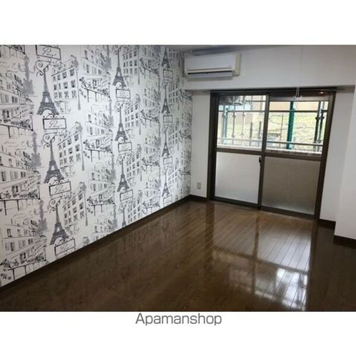 愛知県名古屋市千種区星ケ丘2丁目の賃貸マンションの居間