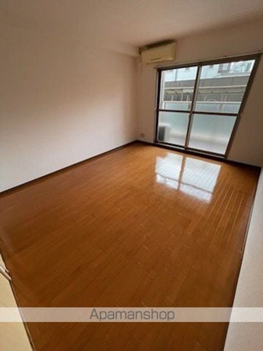 滋賀県草津市野路3丁目の賃貸マンションの居間