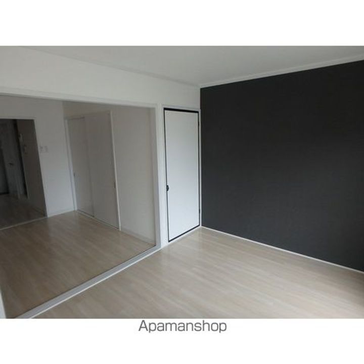 千葉県柏市東3丁目の賃貸マンションの居間