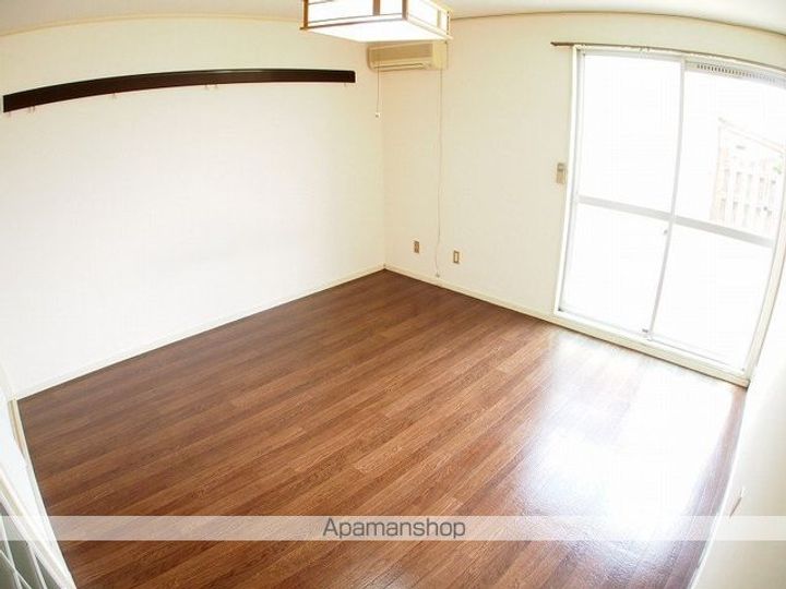 信大前青山ハイツA102の居間