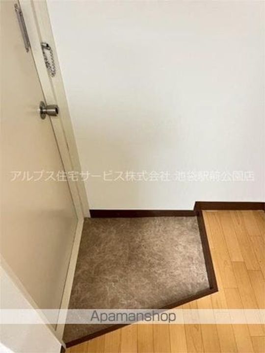 コーポステーションサイドコシベの玄関