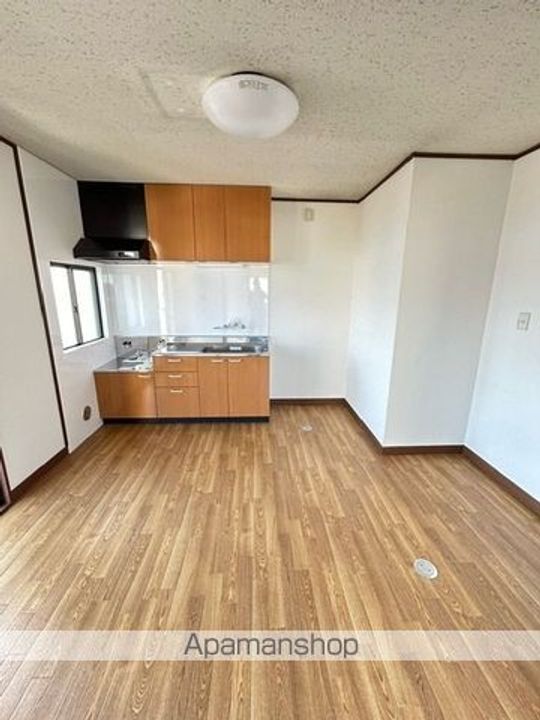 スカイハイツいせひろ401の居間