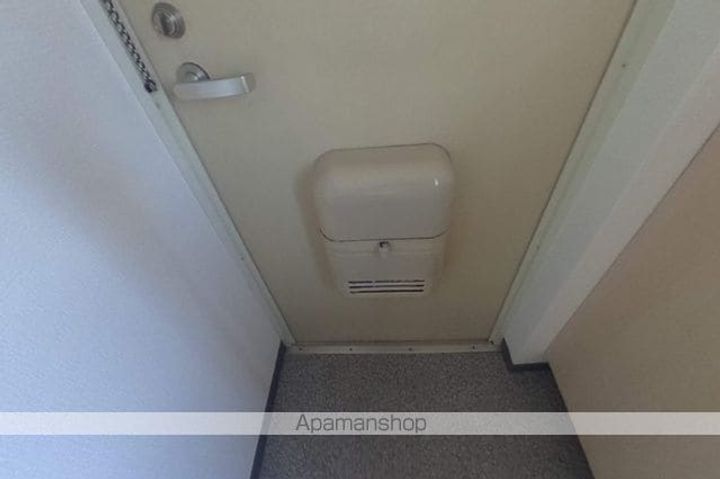 パルコート古川109の玄関