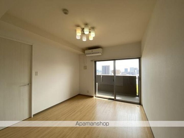 アルファライフ栗林駅北905の居間