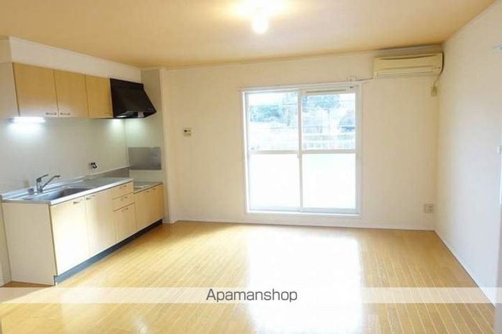 滋賀県湖南市菩提寺北1丁目の賃貸アパートの居間