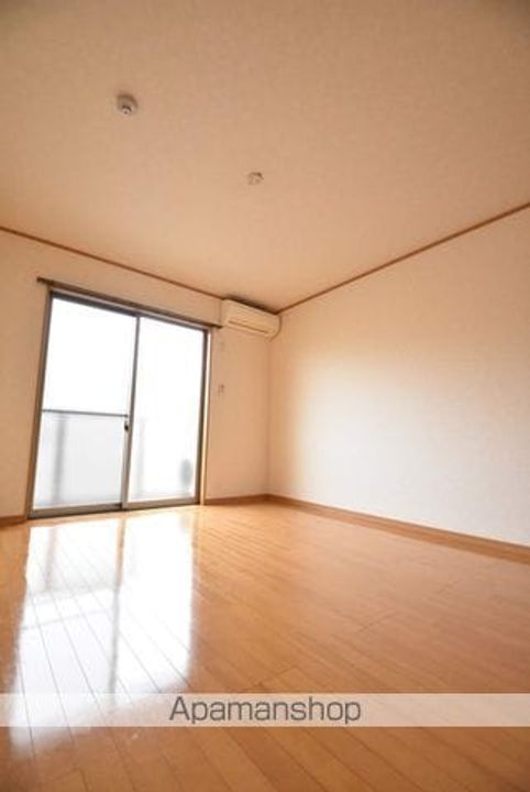 広島県安芸高田市吉田町常友の賃貸アパート204の居間