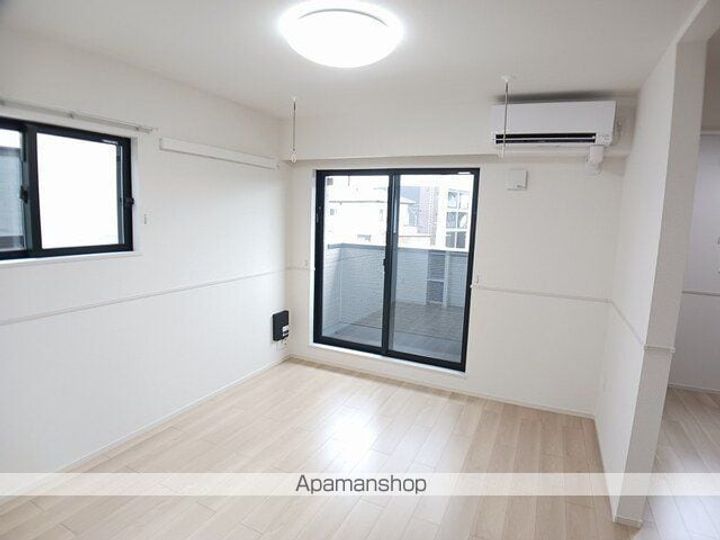 茨城県土浦市荒川沖西1丁目の賃貸アパートの居間