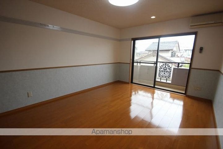 福島県郡山市芳賀2丁目の賃貸マンションの居間