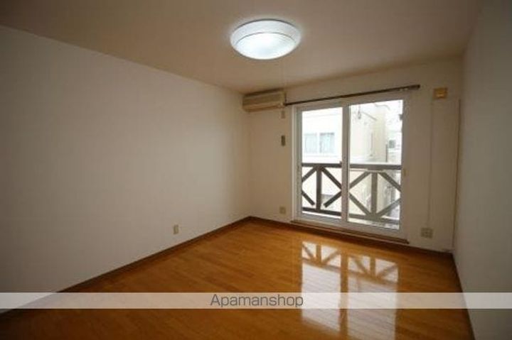 メゾンMITSUI203の居間