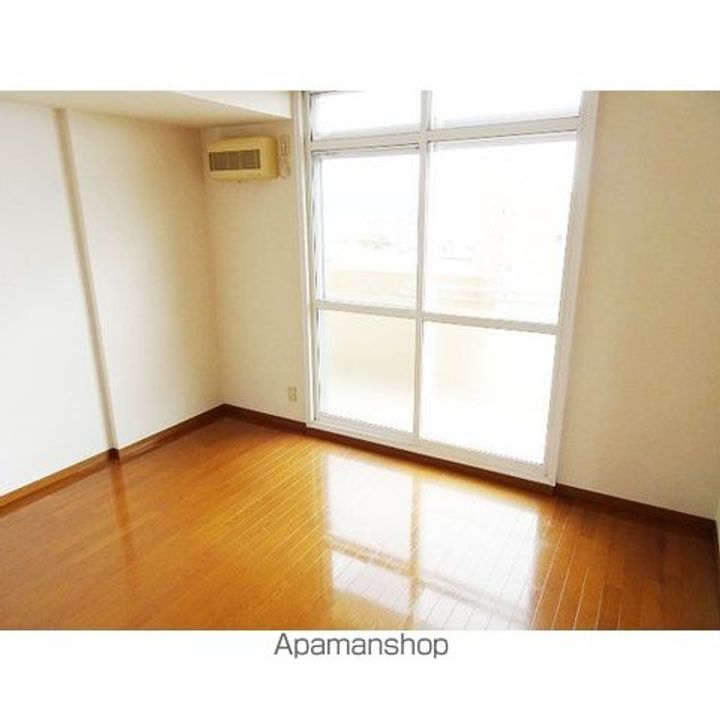 フェイマスKITAMI1番館401の居間