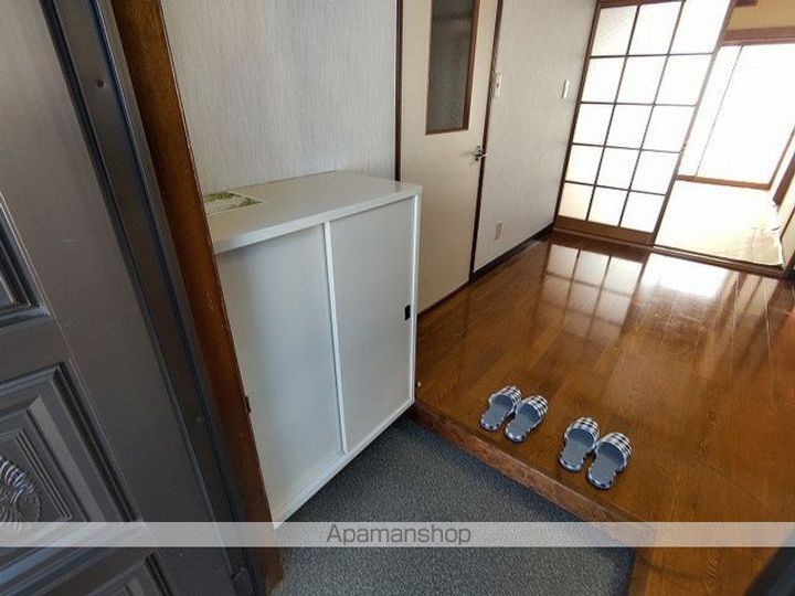 アメニティー県A棟B棟A202の玄関