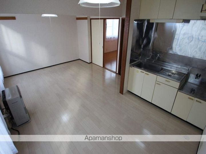 北海道江別市野幌町の賃貸マンション303の居間