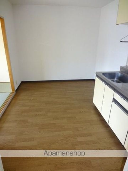 メゾン中塚206の居間