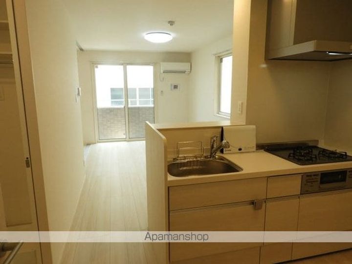 岡山県岡山市北区平野の賃貸アパートの居間