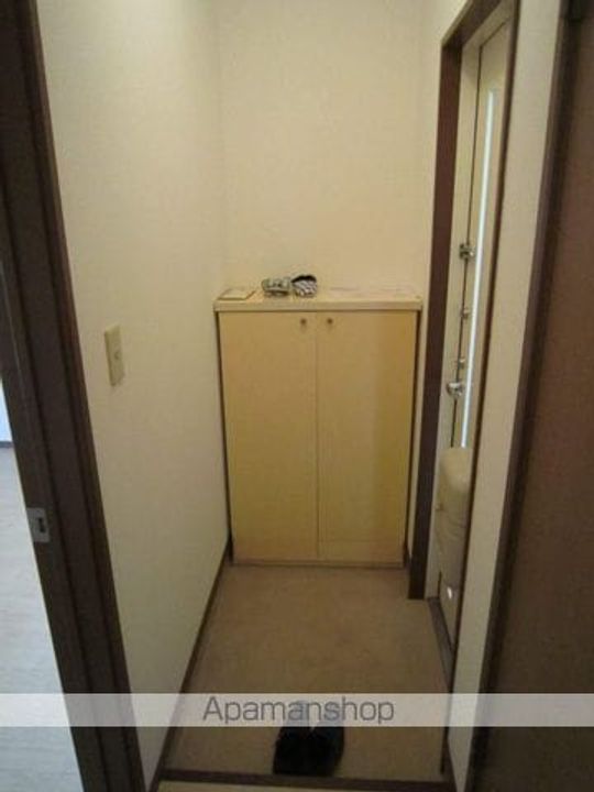 三井エクセルガーデン201の玄関