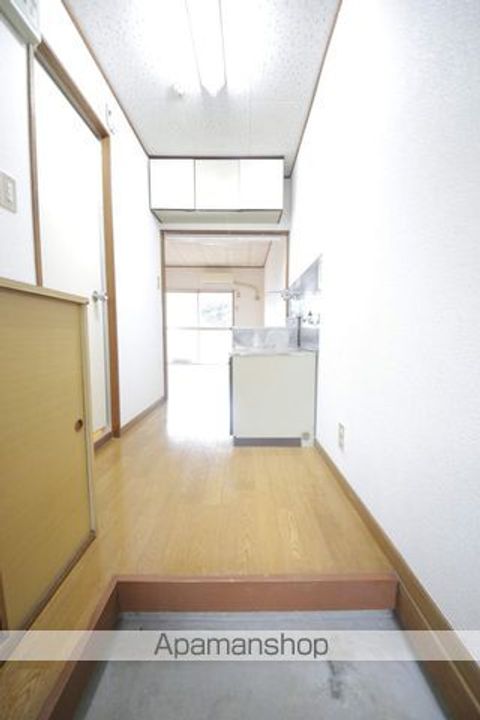 グリーンプラザ滝山113の玄関