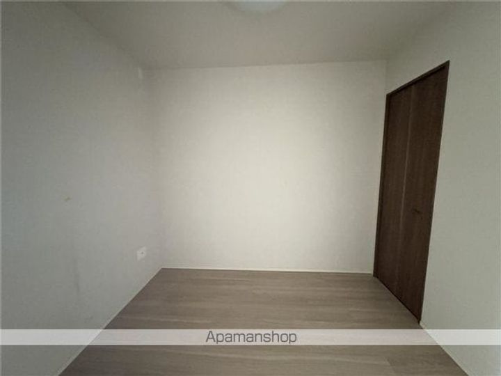 ライオンズ浦添城間グランテラス503の居間