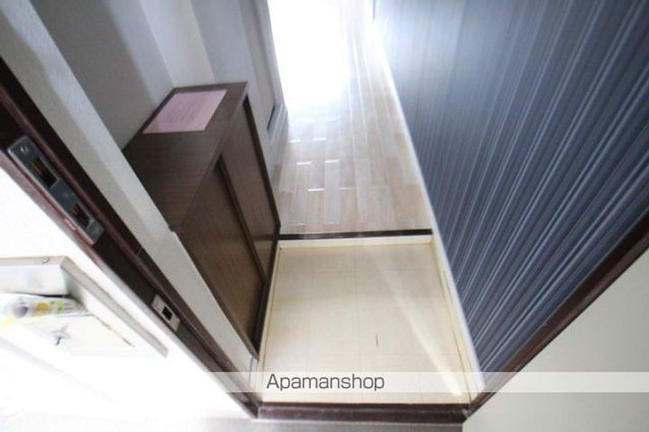 京急西広島マンションの玄関