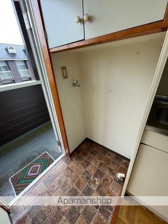 グリンピュア古川C棟206の玄関