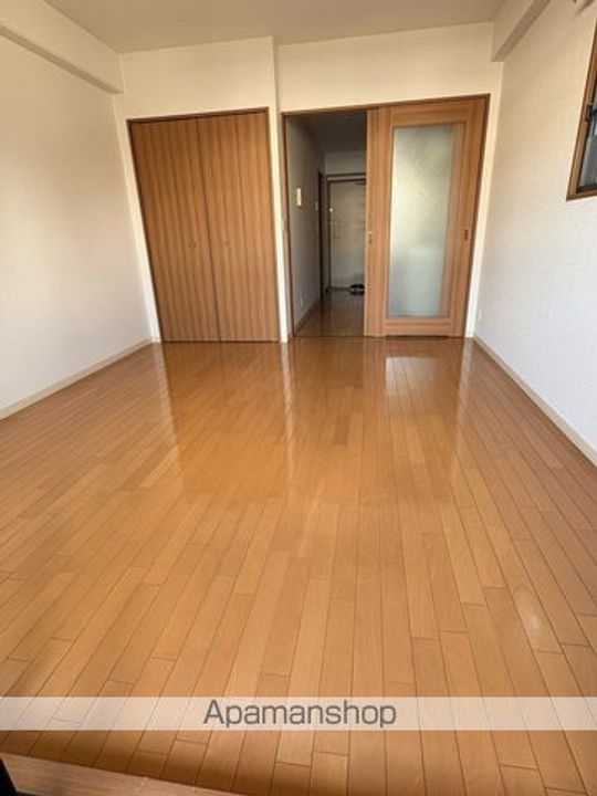 大阪府堺市北区北花田町1丁の賃貸マンションの居間