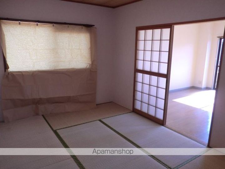 愛知県名古屋市港区春田野1丁目の賃貸マンションの居間