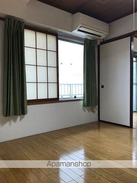 陣場中央ビル306の居間