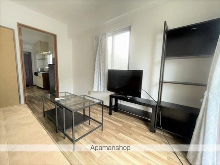 香川県高松市室新町の賃貸マンションの居間