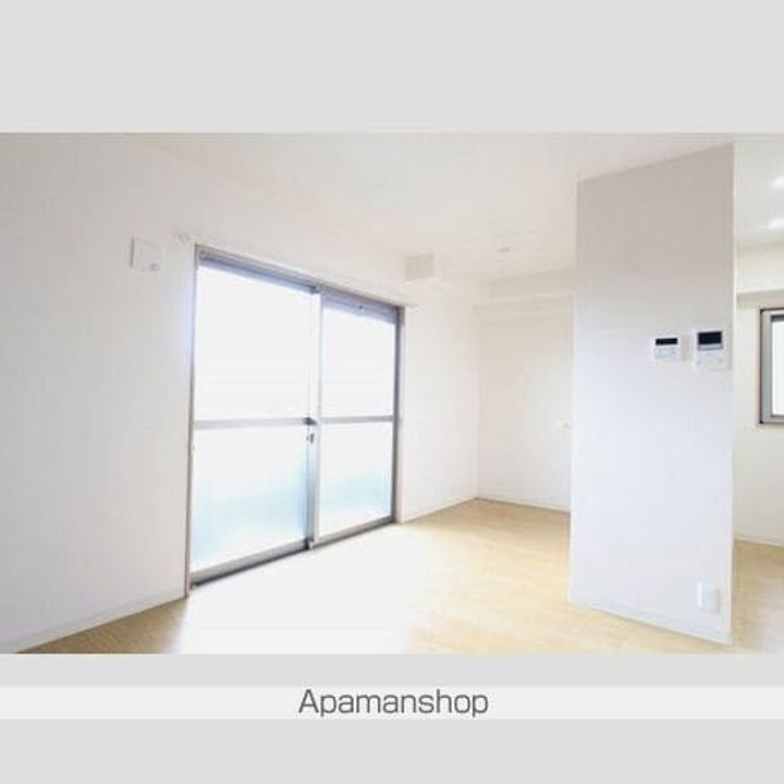 愛知県名古屋市千種区新西1丁目の賃貸マンションの居間