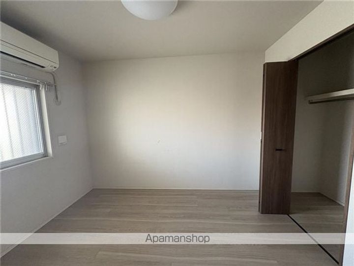 ライオンズ浦添城間グランテラス503の居間