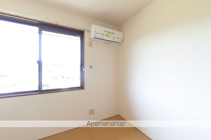 高知県土佐市蓮池の賃貸アパートの居間