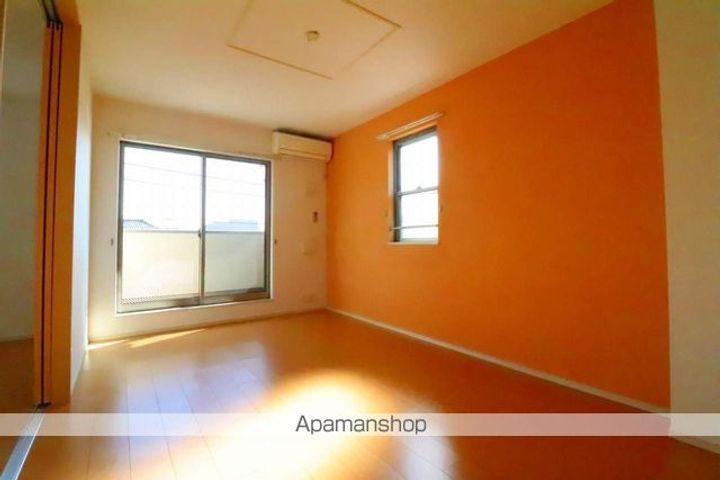 東京都羽村市羽西1丁目の賃貸アパートの居間