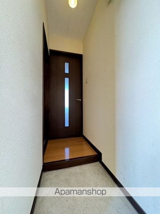 パステルコートミナト207の玄関