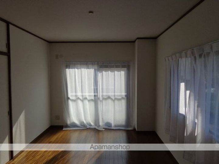 フラワーハイツ久米・の居間