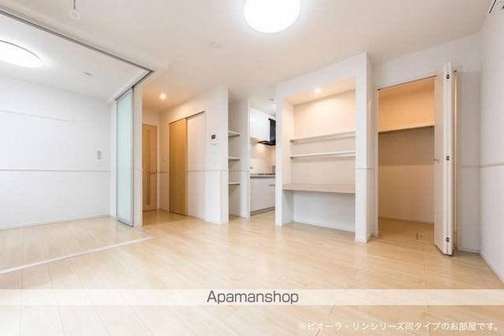 愛媛県新居浜市庄内町6丁目の賃貸アパートの居間