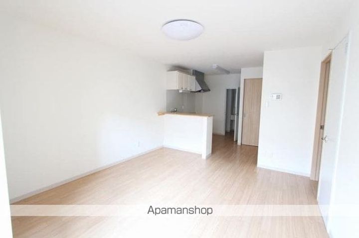 香川県高松市藤塚町3丁目の賃貸マンションの居間