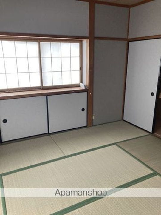 メゾン水明102の居間