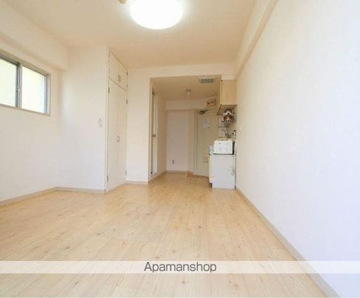 香川県高松市瓦町1丁目の賃貸マンションの居間