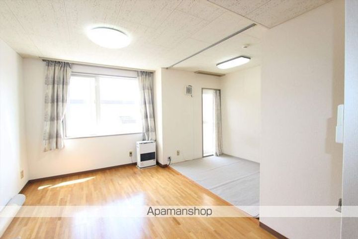 北海道網走市南四条東5丁目の賃貸マンションの居間