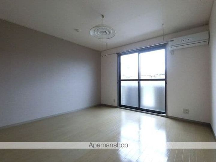 エクセルタムラAの居間