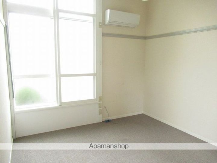 パークサイド室小路109の居間