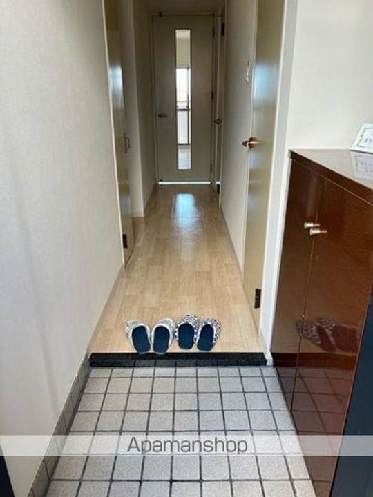 ファミール徳常163の玄関