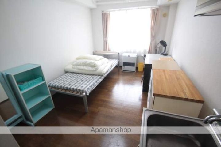 キャンパス文京台401の居間