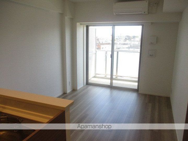 東京都中野区大和町1丁目の賃貸マンションの居間