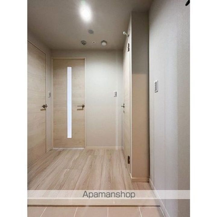 アルファコート谷在家の玄関